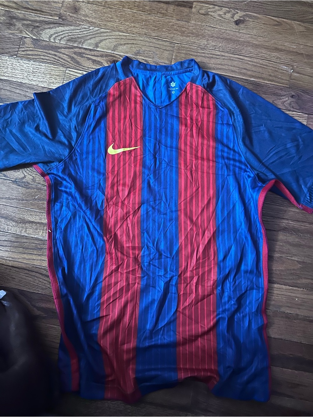 Nike Men’s Blue & Red Striped Soccer Jersey with Yellow Swoosh